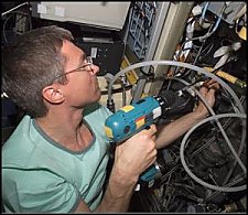 Commander Sergei Krikalev works on the Elektron oxygen generator